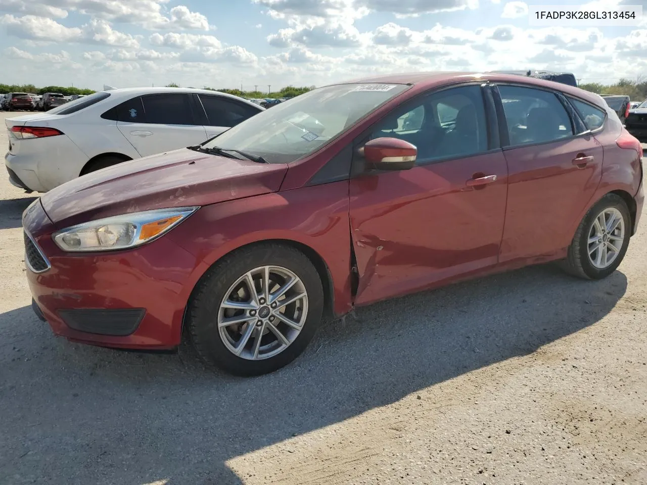 2016 Ford Focus Se VIN: 1FADP3K28GL313454 Lot: 71742004