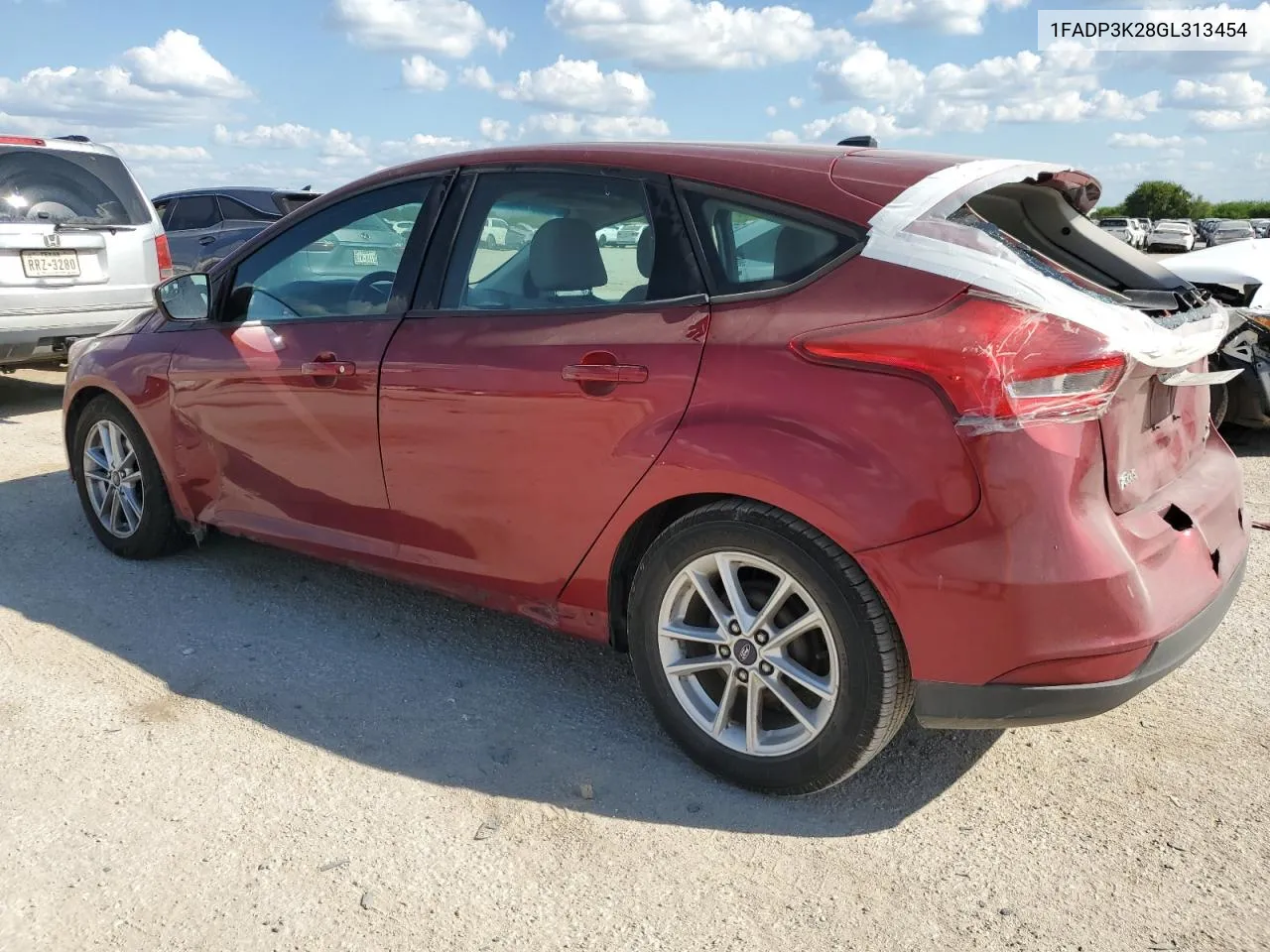 2016 Ford Focus Se VIN: 1FADP3K28GL313454 Lot: 71742004