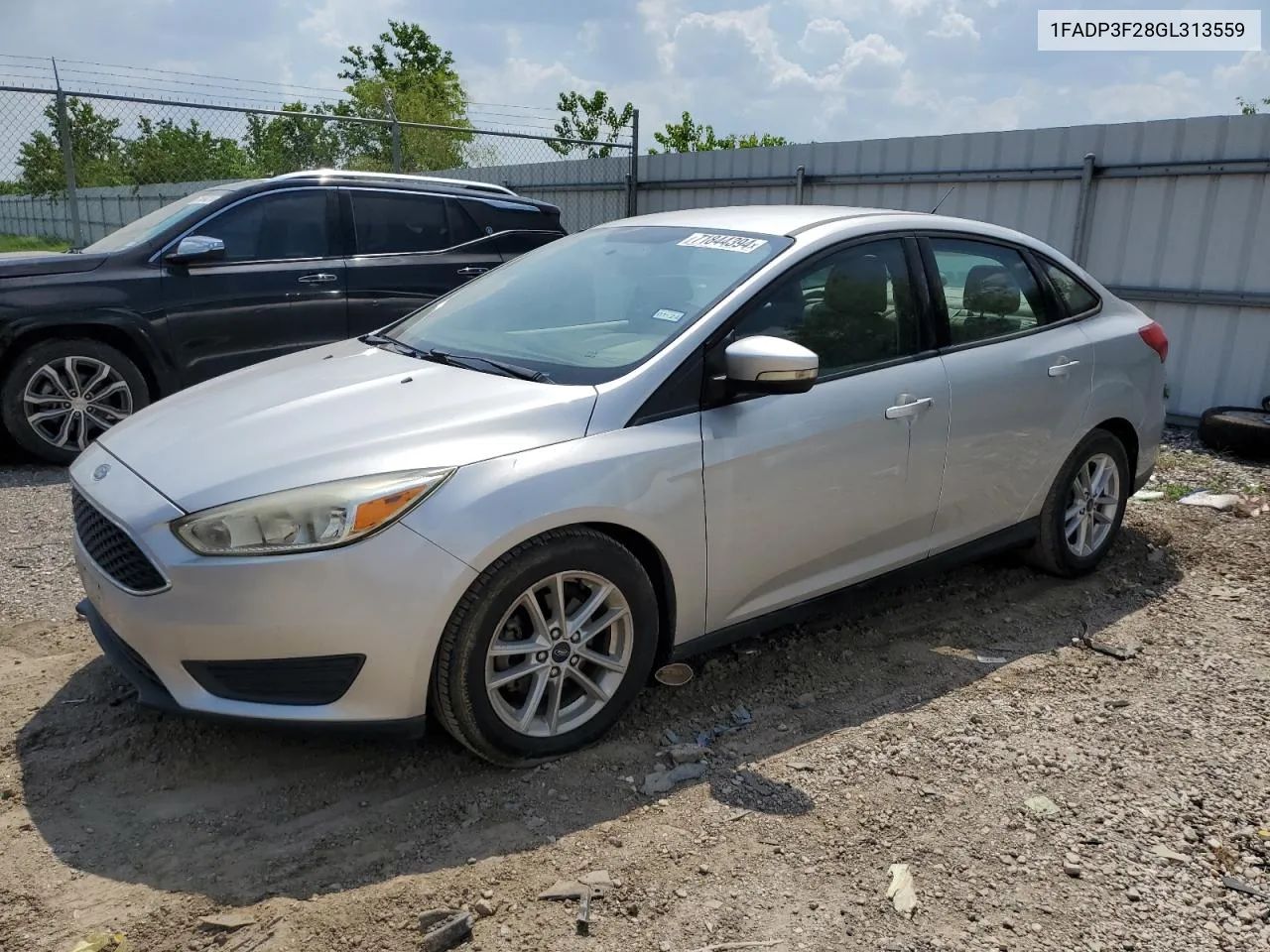 2016 Ford Focus Se VIN: 1FADP3F28GL313559 Lot: 71844394