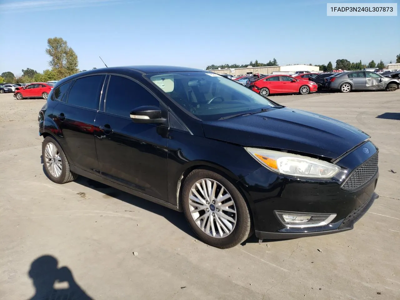 2016 Ford Focus Titanium VIN: 1FADP3N24GL307873 Lot: 72626274