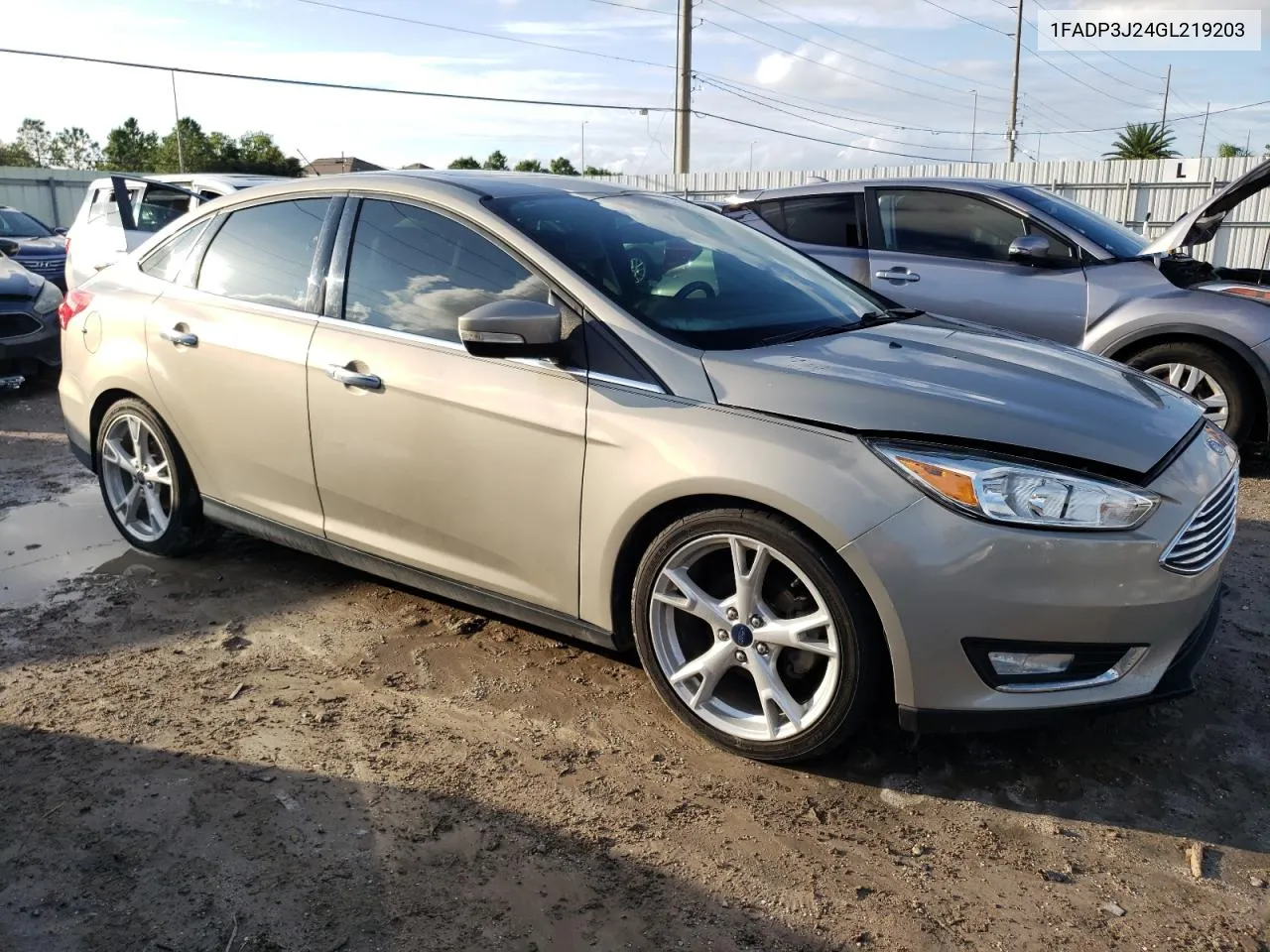 2016 Ford Focus Titanium VIN: 1FADP3J24GL219203 Lot: 73720004