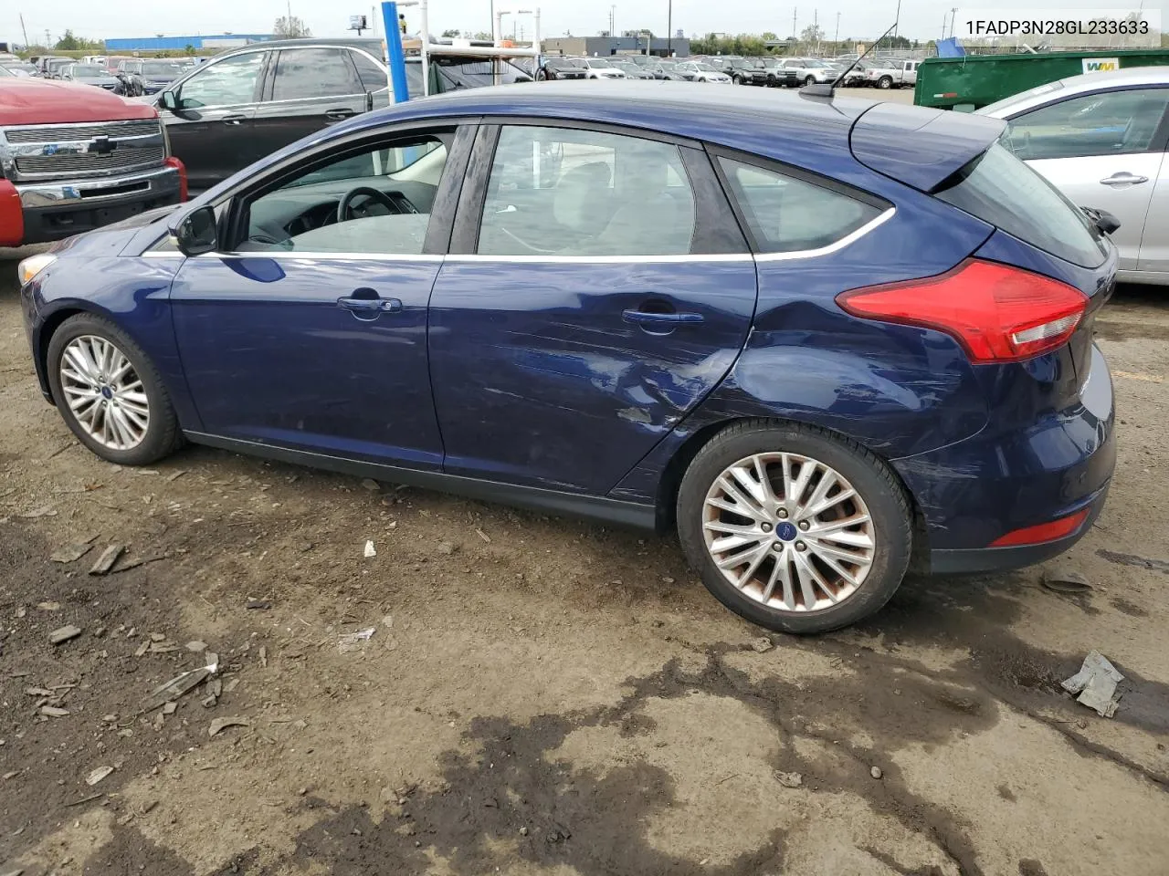 2016 Ford Focus Titanium VIN: 1FADP3N28GL233633 Lot: 73802184