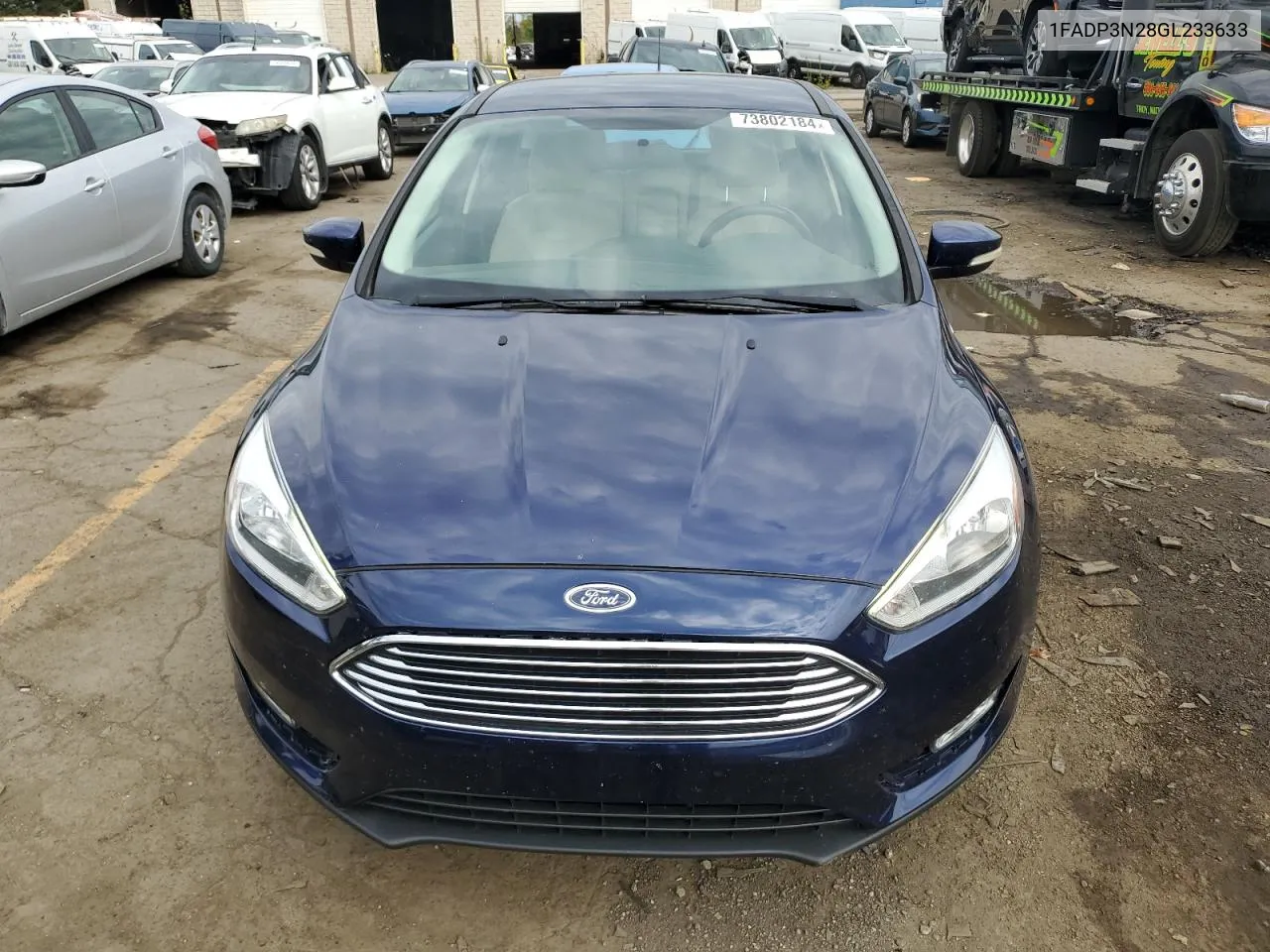 2016 Ford Focus Titanium VIN: 1FADP3N28GL233633 Lot: 73802184