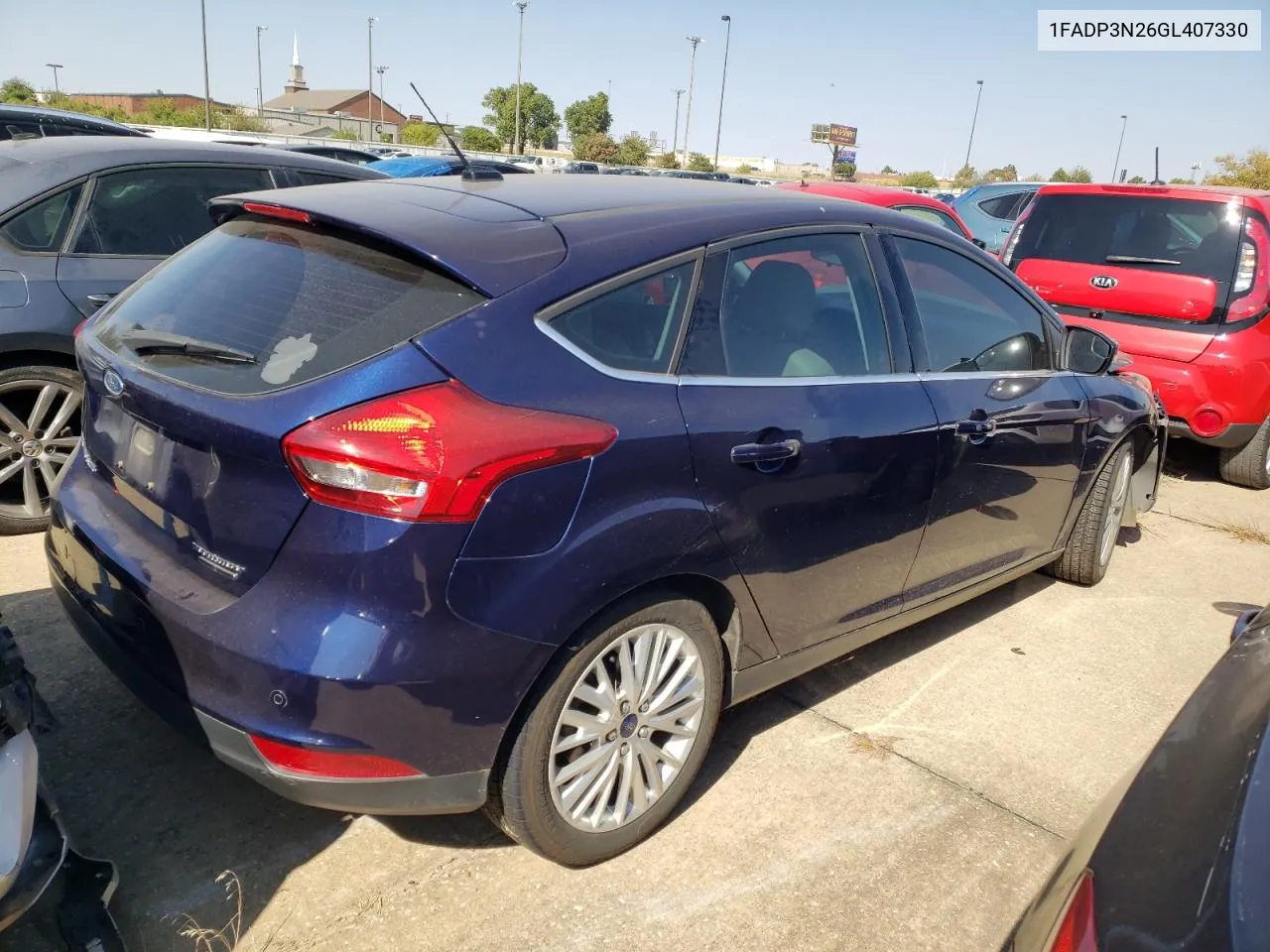 2016 Ford Focus Titanium VIN: 1FADP3N26GL407330 Lot: 74274254