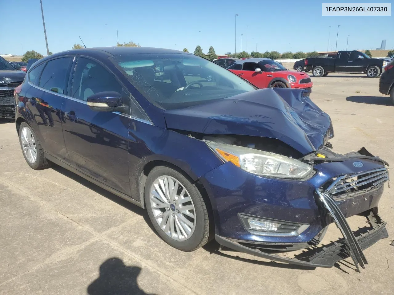 2016 Ford Focus Titanium VIN: 1FADP3N26GL407330 Lot: 74274254