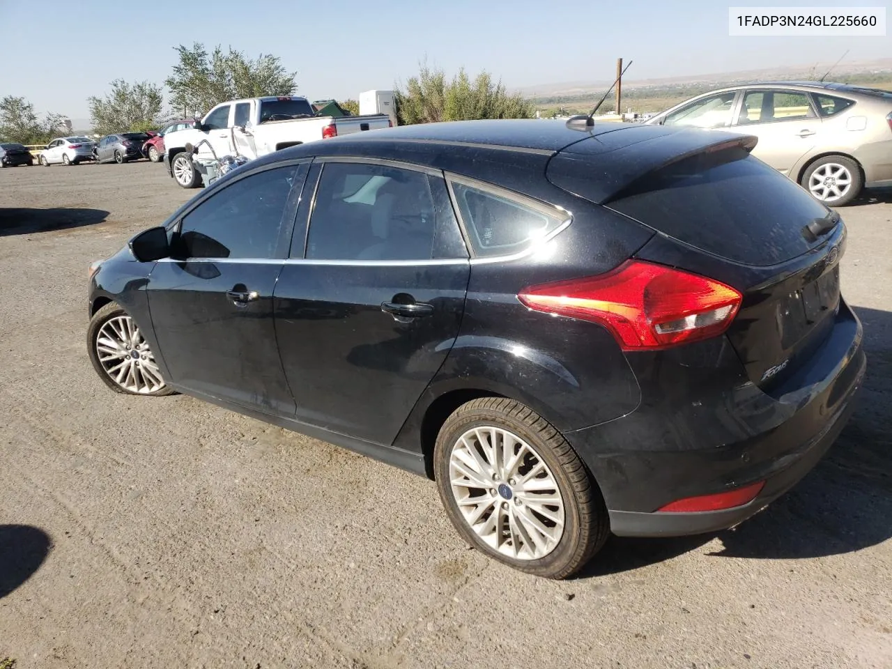 2016 Ford Focus Titanium VIN: 1FADP3N24GL225660 Lot: 74362604