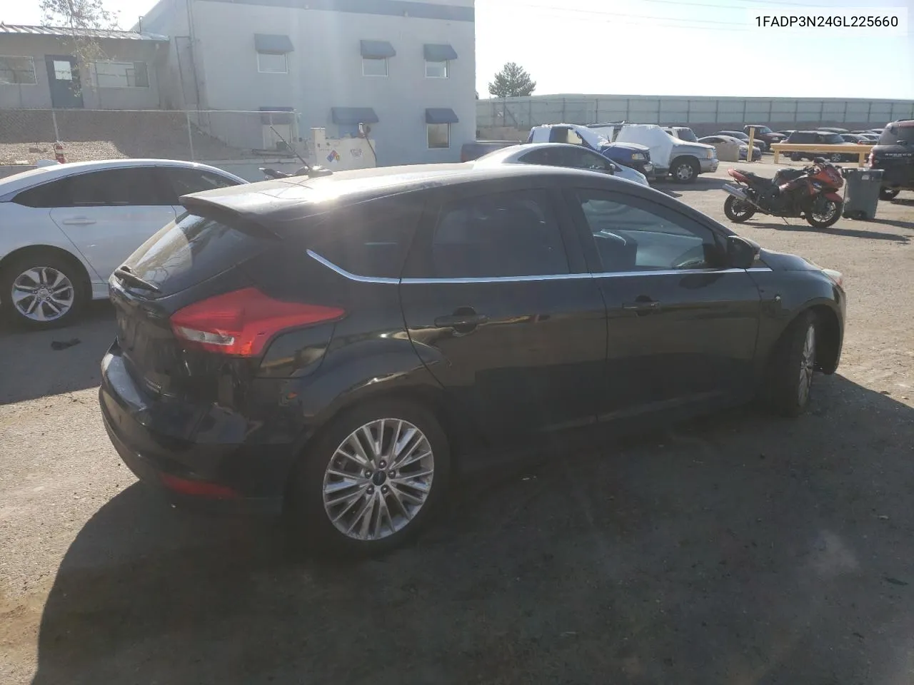 2016 Ford Focus Titanium VIN: 1FADP3N24GL225660 Lot: 74362604