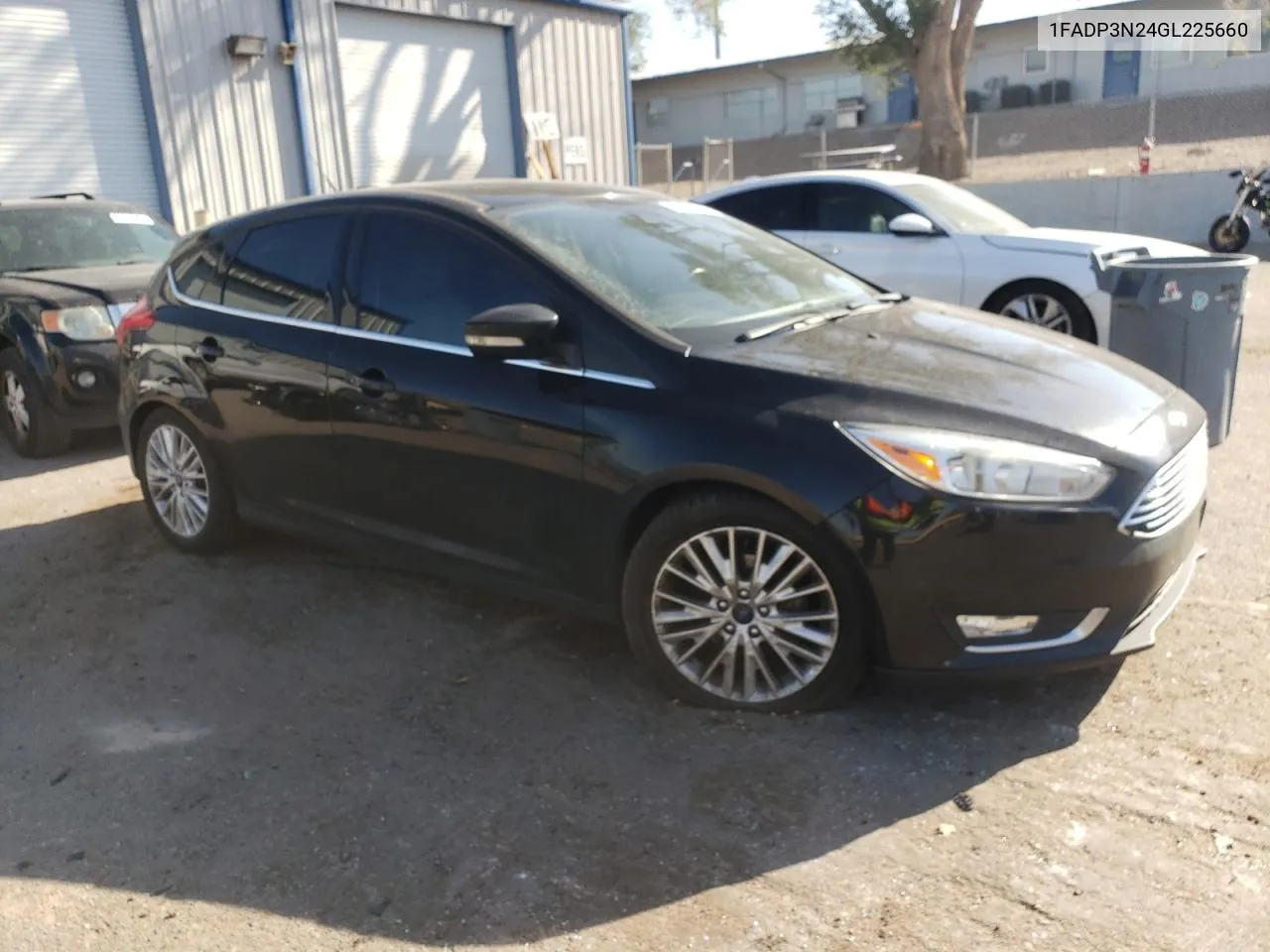 2016 Ford Focus Titanium VIN: 1FADP3N24GL225660 Lot: 74362604