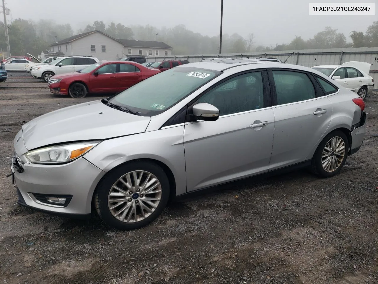 2016 Ford Focus Titanium VIN: 1FADP3J21GL243247 Lot: 74395874