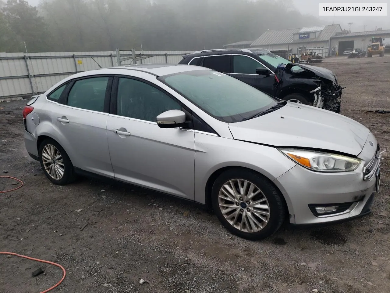 2016 Ford Focus Titanium VIN: 1FADP3J21GL243247 Lot: 74395874