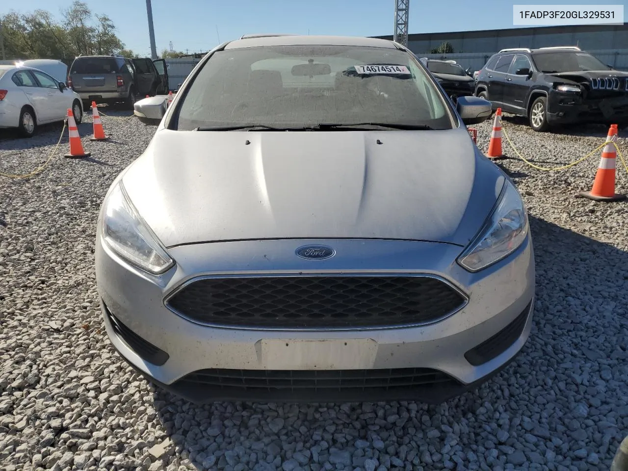 2016 Ford Focus Se VIN: 1FADP3F20GL329531 Lot: 74674514