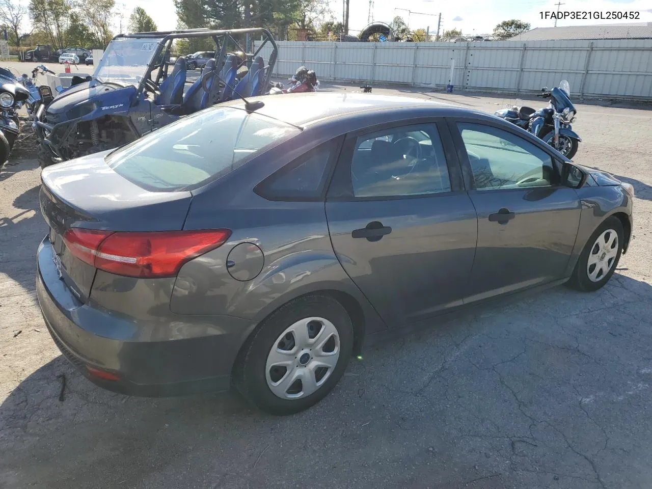 2016 Ford Focus S VIN: 1FADP3E21GL250452 Lot: 76008874