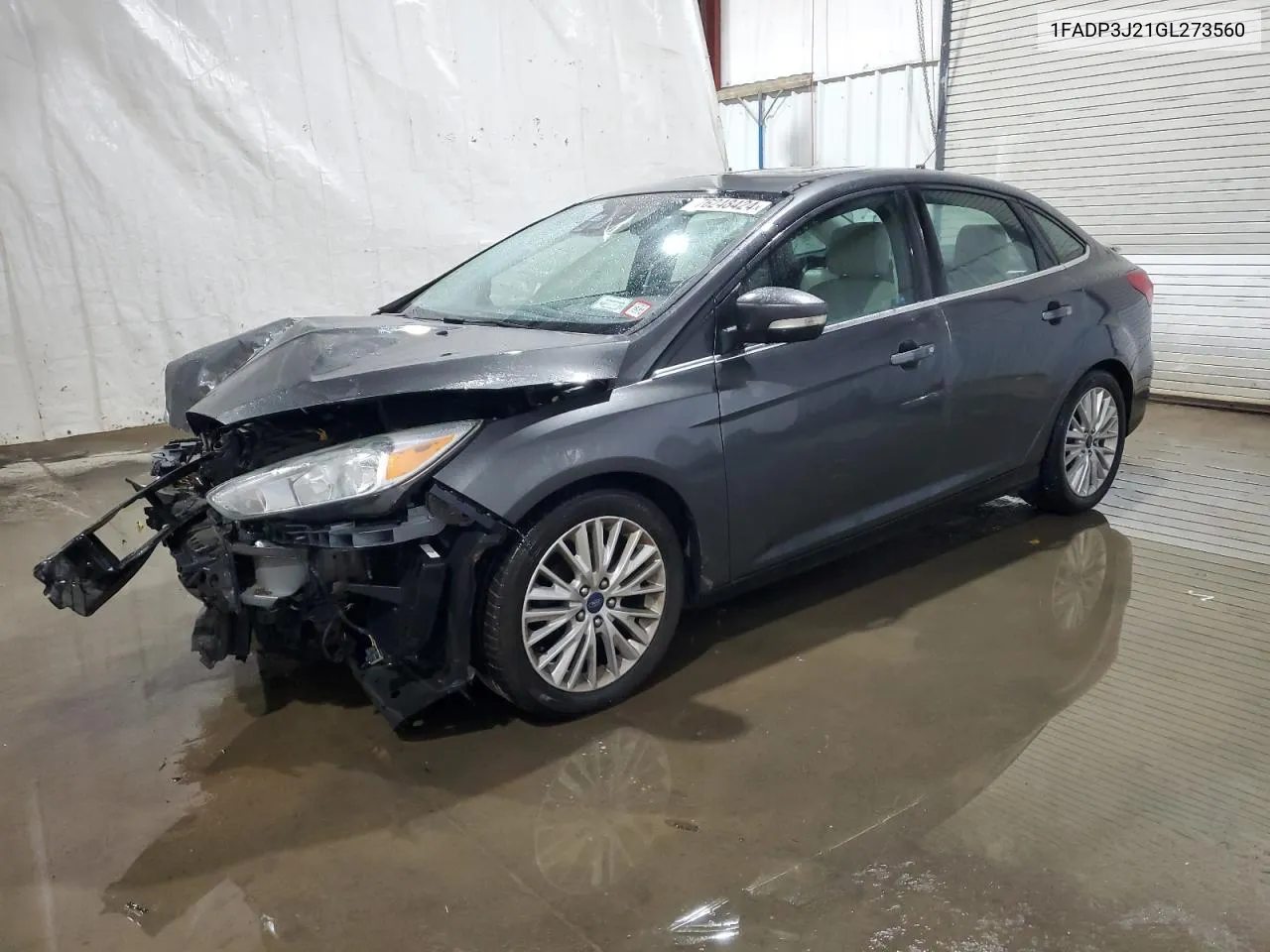 2016 Ford Focus Titanium VIN: 1FADP3J21GL273560 Lot: 76248424