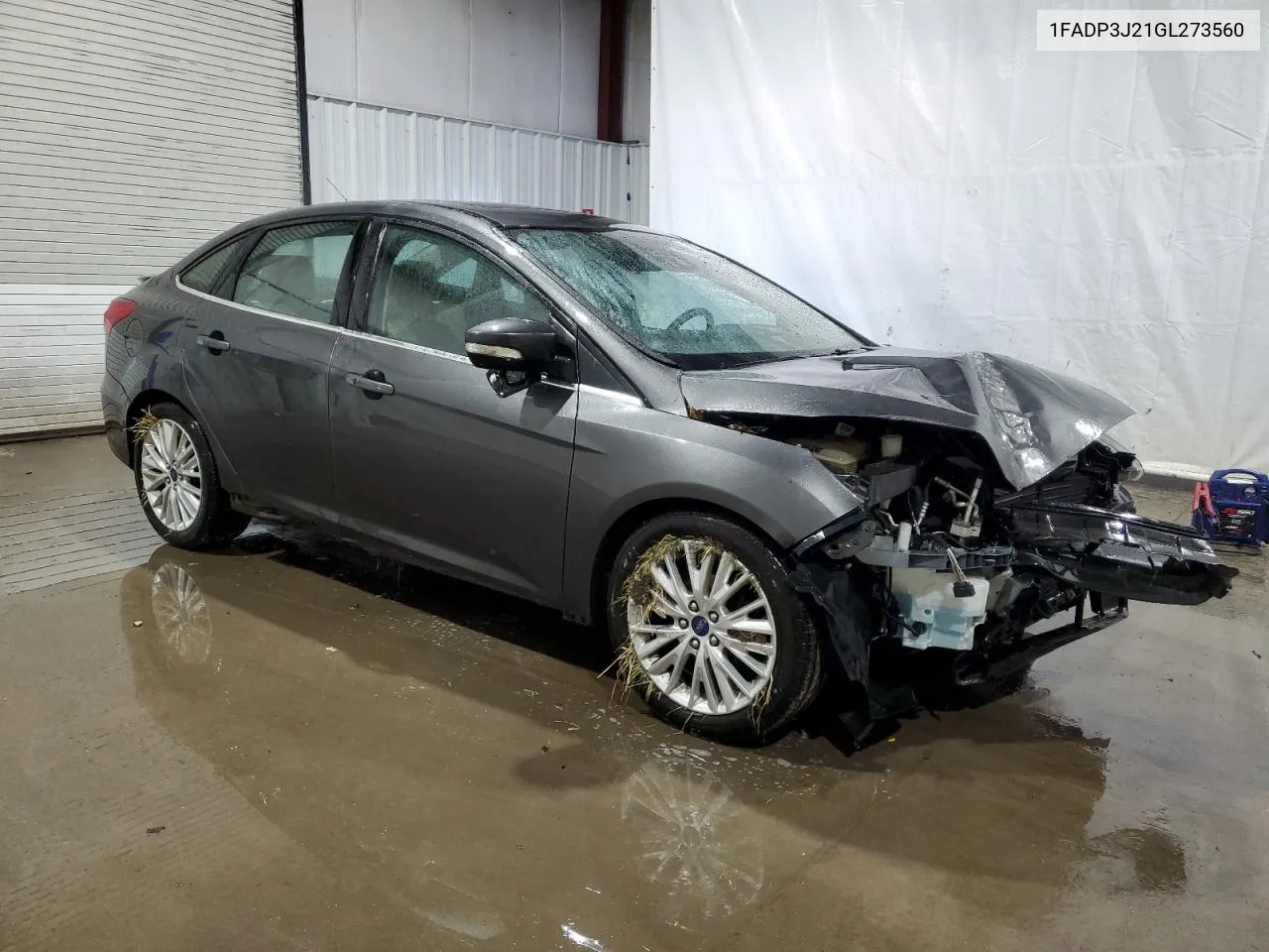 2016 Ford Focus Titanium VIN: 1FADP3J21GL273560 Lot: 76248424