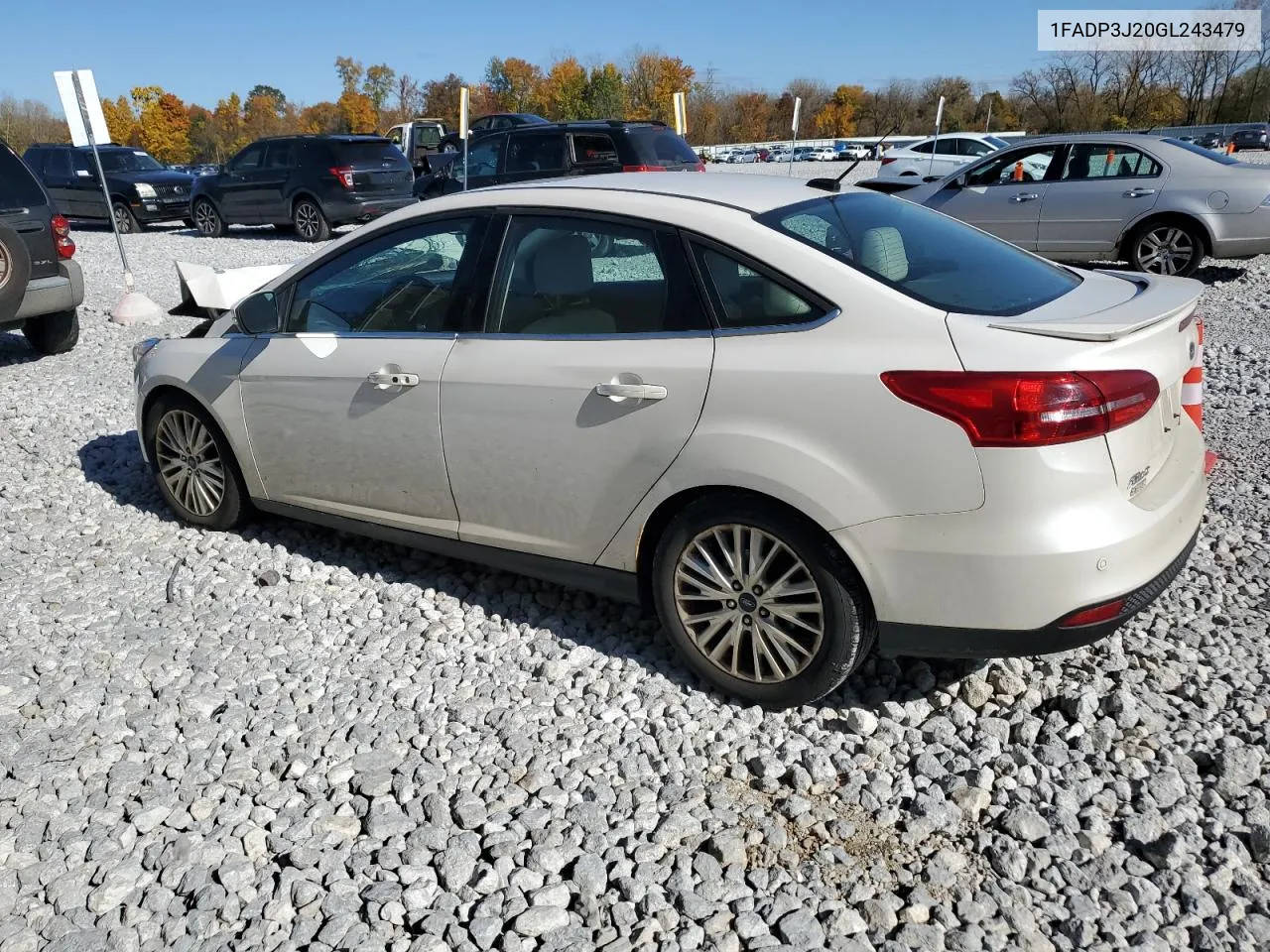 2016 Ford Focus Titanium VIN: 1FADP3J20GL243479 Lot: 77575754