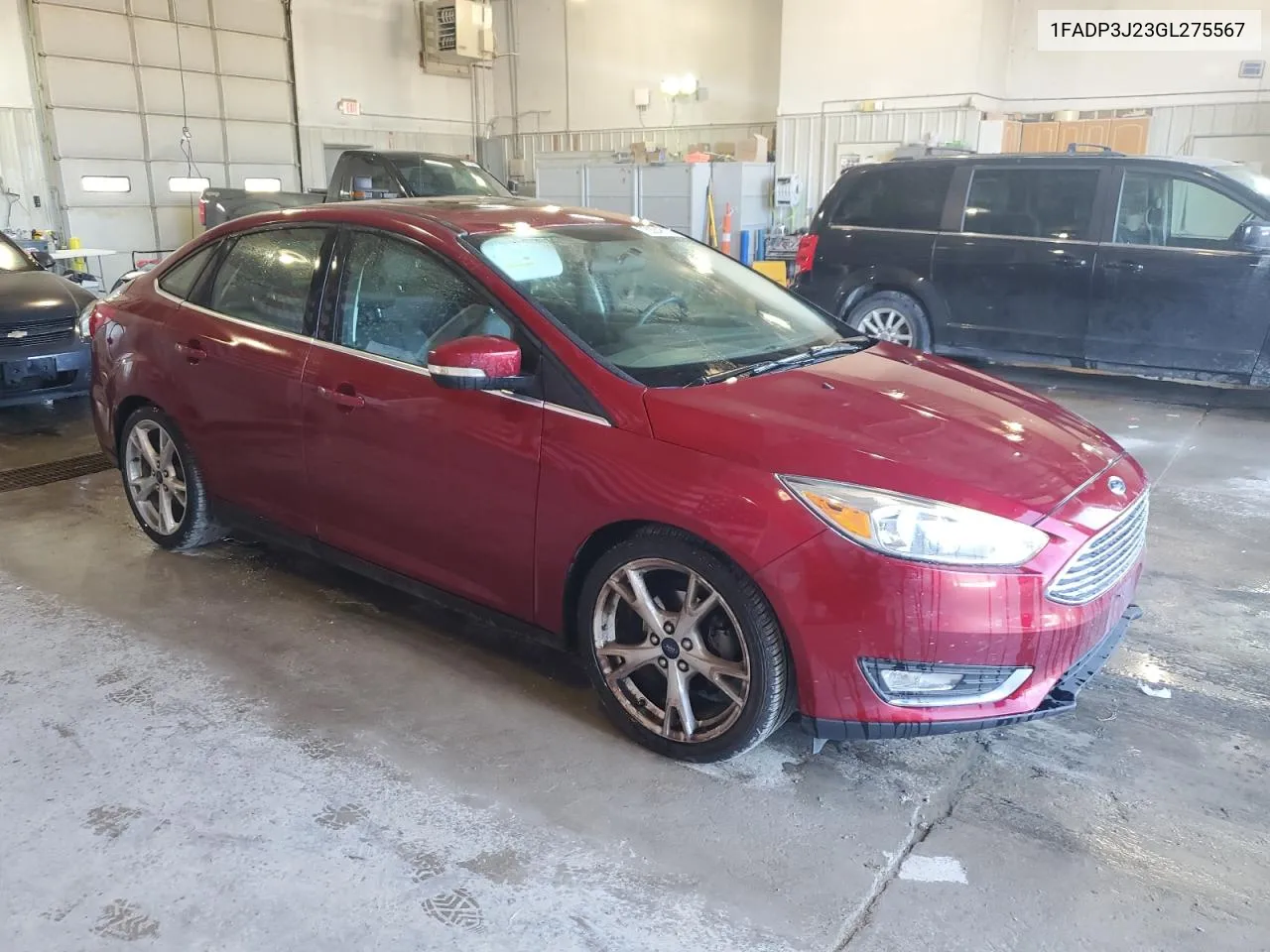 2016 Ford Focus Titanium VIN: 1FADP3J23GL275567 Lot: 78204814