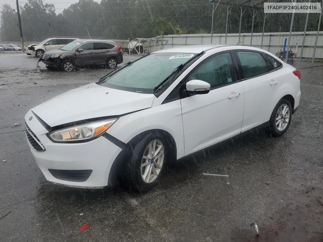 2016 Ford Focus Se VIN: 1FADP3F24GL402416 Lot: 79163094