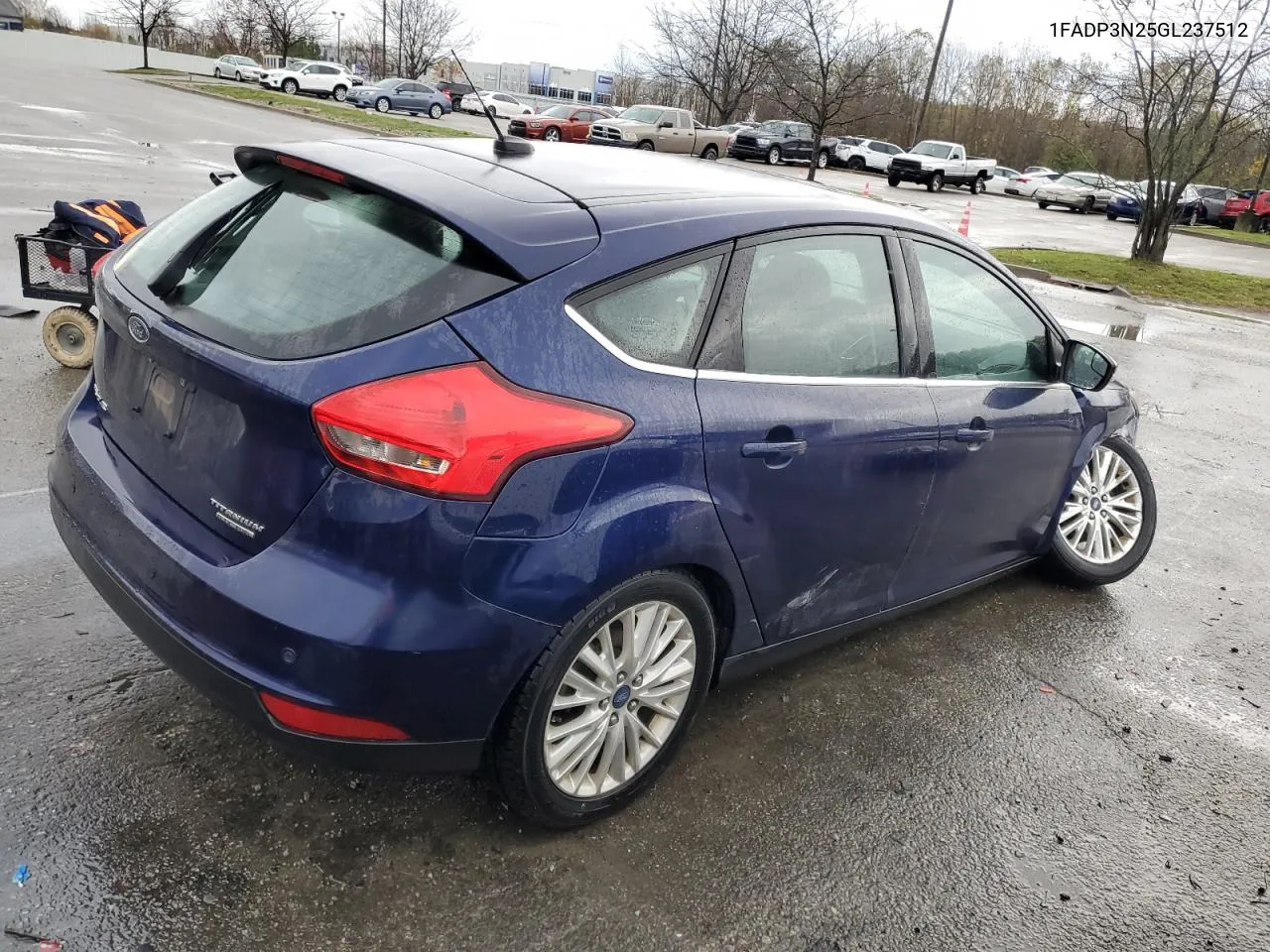 2016 Ford Focus Titanium VIN: 1FADP3N25GL237512 Lot: 79415834