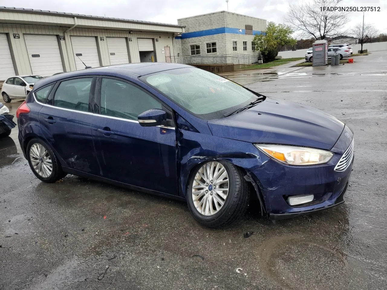 2016 Ford Focus Titanium VIN: 1FADP3N25GL237512 Lot: 79415834