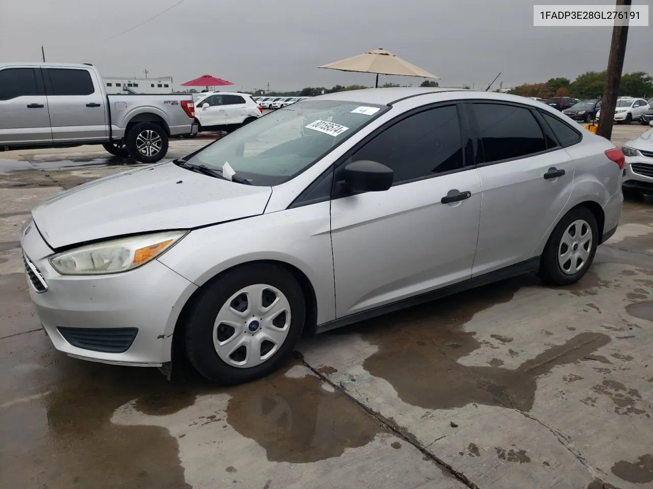 2016 Ford Focus S VIN: 1FADP3E28GL276191 Lot: 80159574