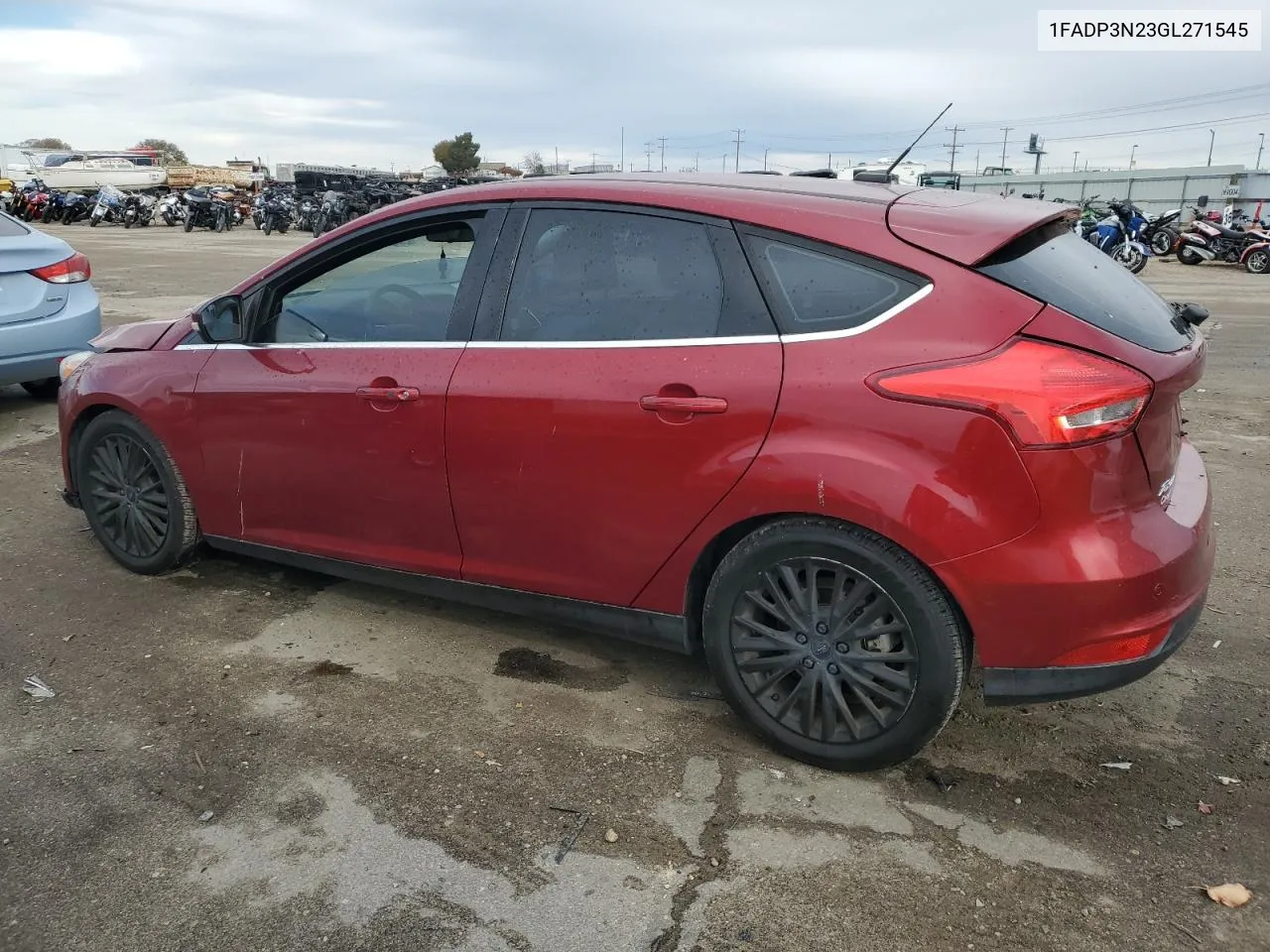 2016 Ford Focus Titanium VIN: 1FADP3N23GL271545 Lot: 80321494