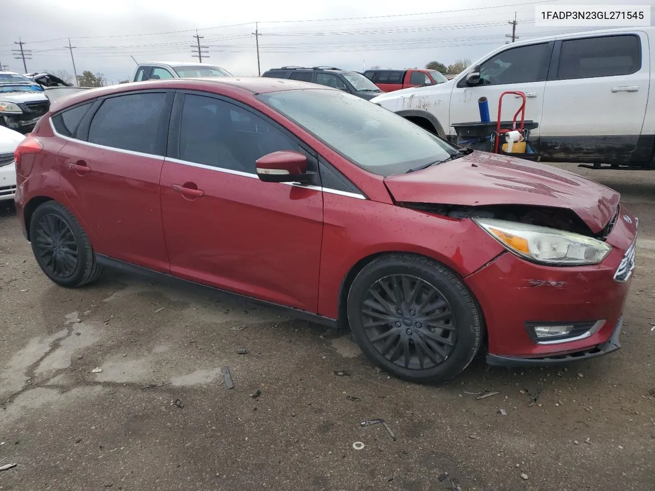 2016 Ford Focus Titanium VIN: 1FADP3N23GL271545 Lot: 80321494