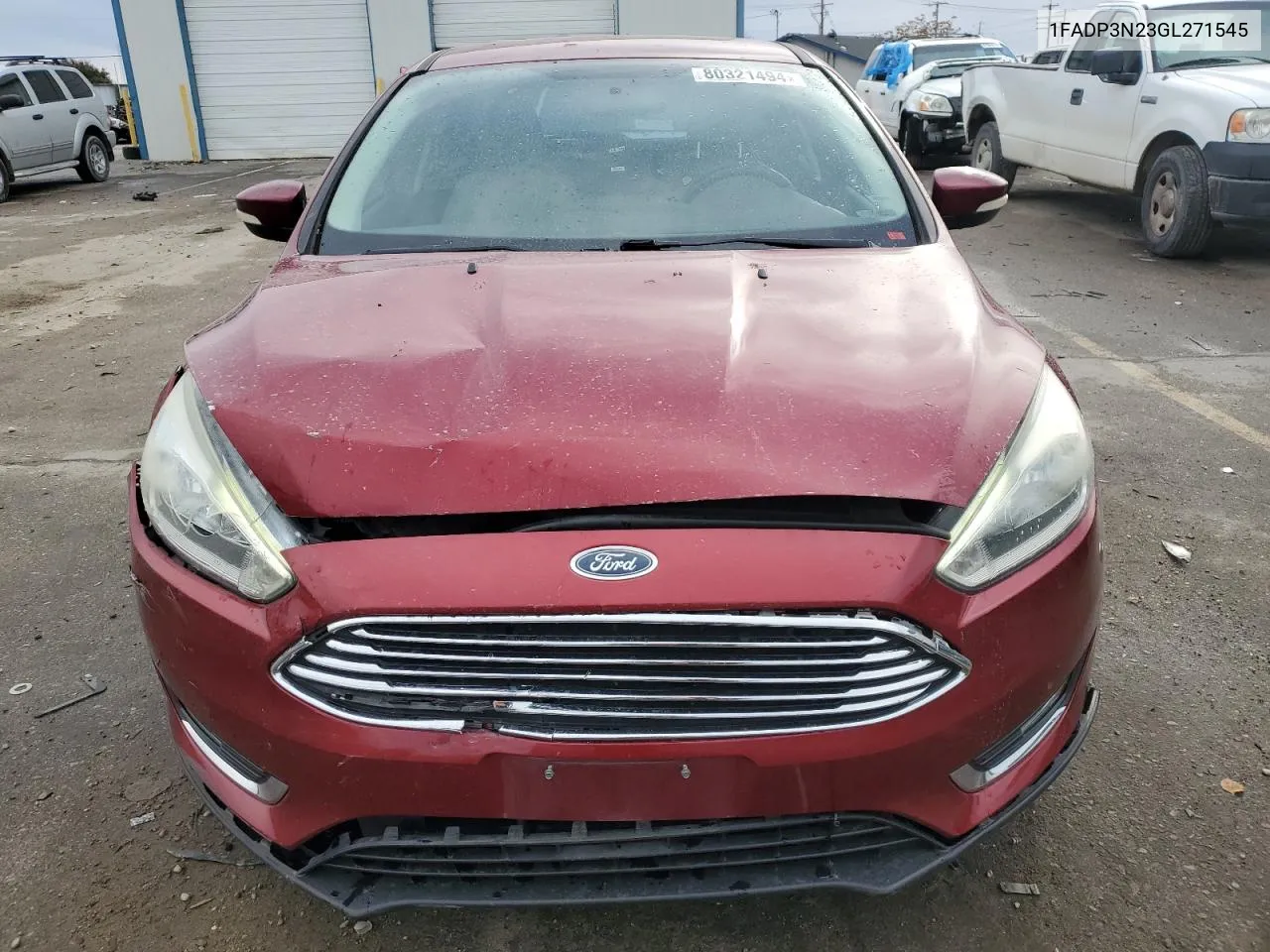 2016 Ford Focus Titanium VIN: 1FADP3N23GL271545 Lot: 80321494