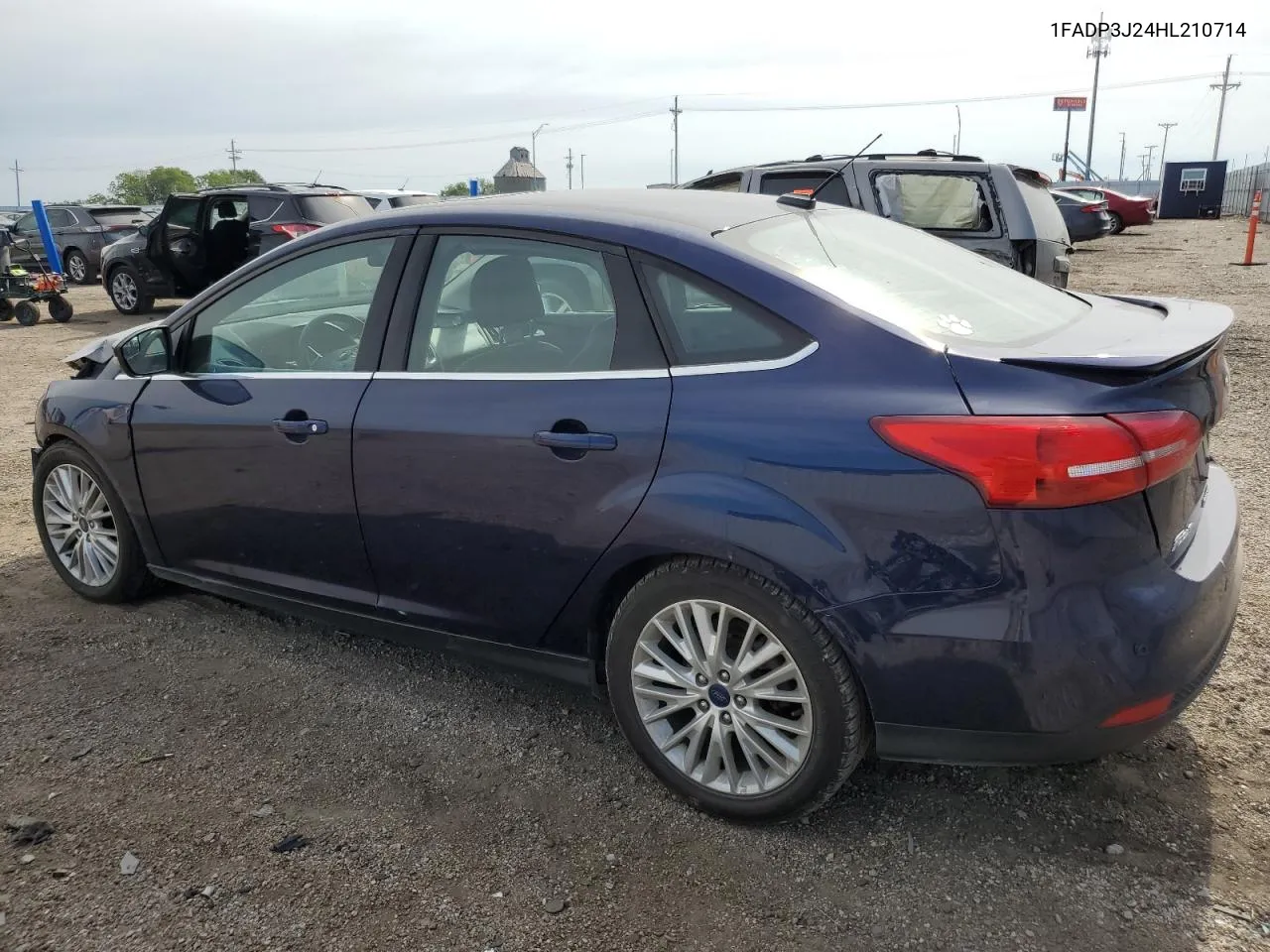 2017 Ford Focus Titanium VIN: 1FADP3J24HL210714 Lot: 58754584