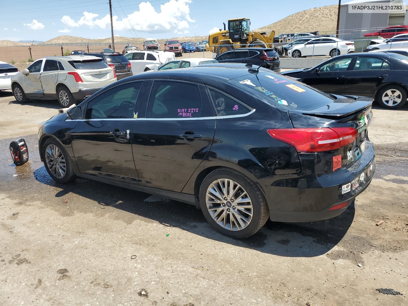 2017 Ford Focus Titanium VIN: 1FADP3J21HL210783 Lot: 64032154