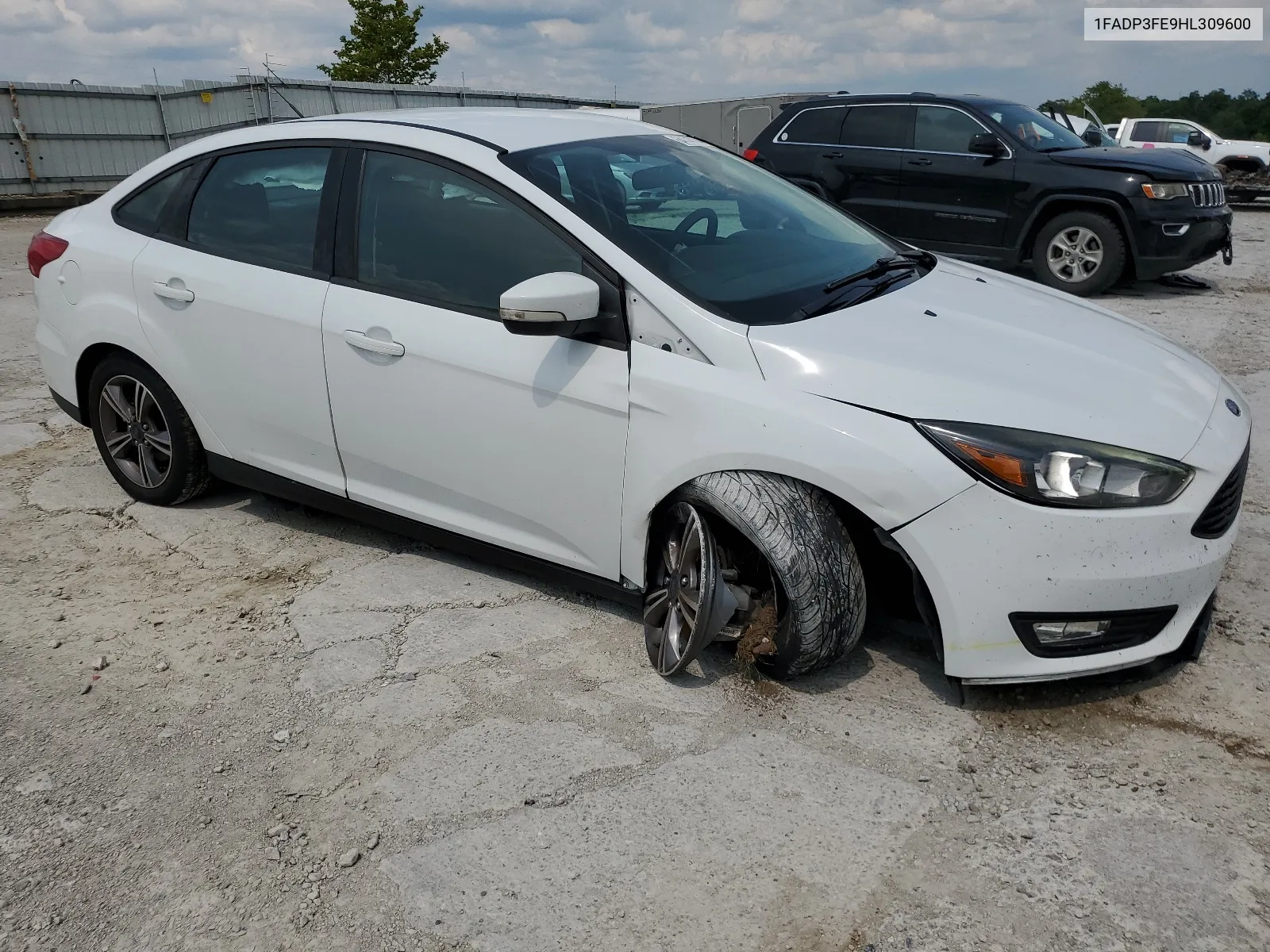 2017 Ford Focus Se VIN: 1FADP3FE9HL309600 Lot: 64147144