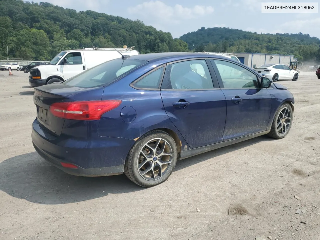 2017 Ford Focus Sel VIN: 1FADP3H24HL318062 Lot: 66579434