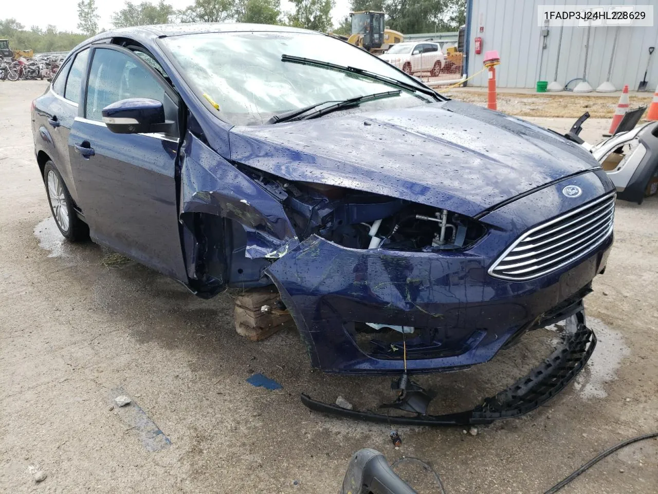 2017 Ford Focus Titanium VIN: 1FADP3J24HL228629 Lot: 67398824