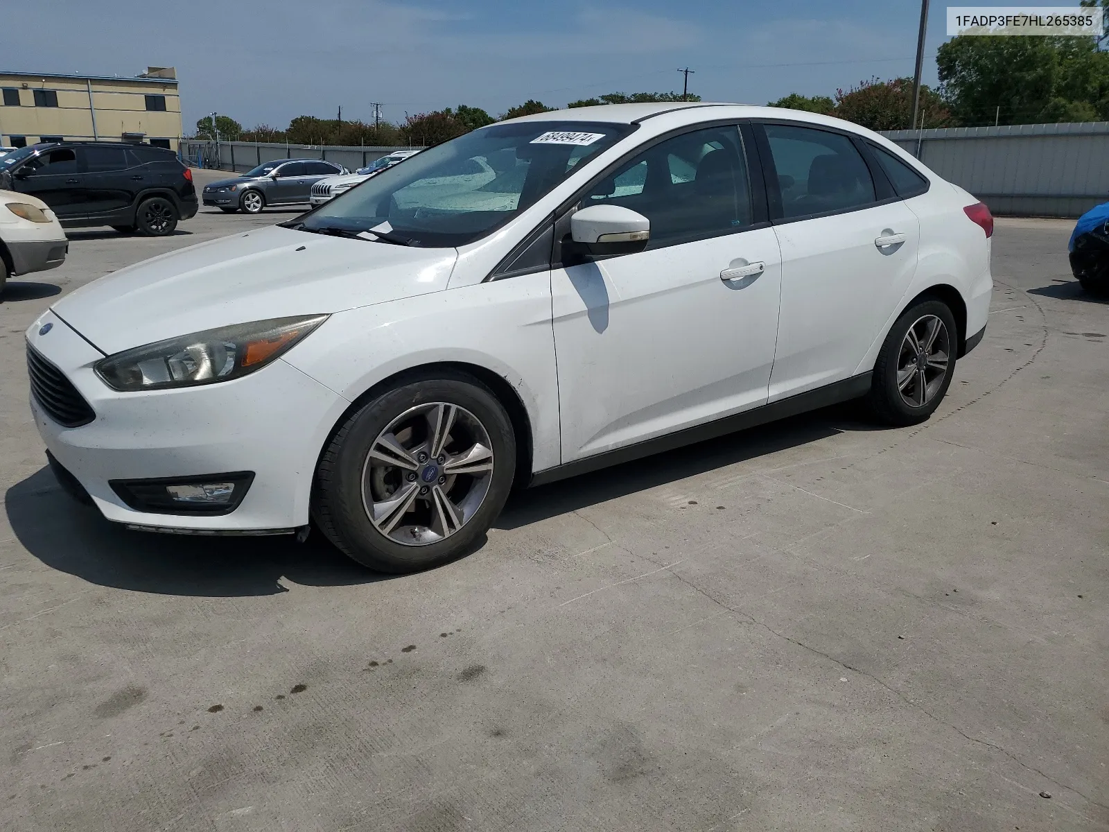 2017 Ford Focus Se VIN: 1FADP3FE7HL265385 Lot: 68499474