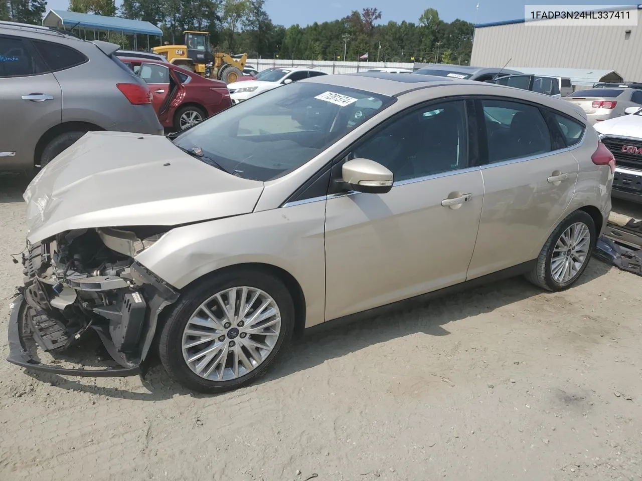 2017 Ford Focus Titanium VIN: 1FADP3N24HL337411 Lot: 71281374