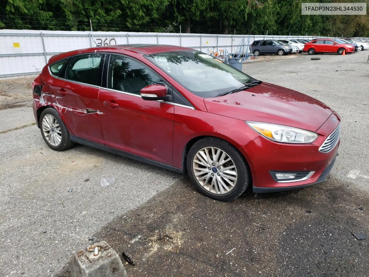 2017 Ford Focus Titanium VIN: 1FADP3N23HL344530 Lot: 71306244