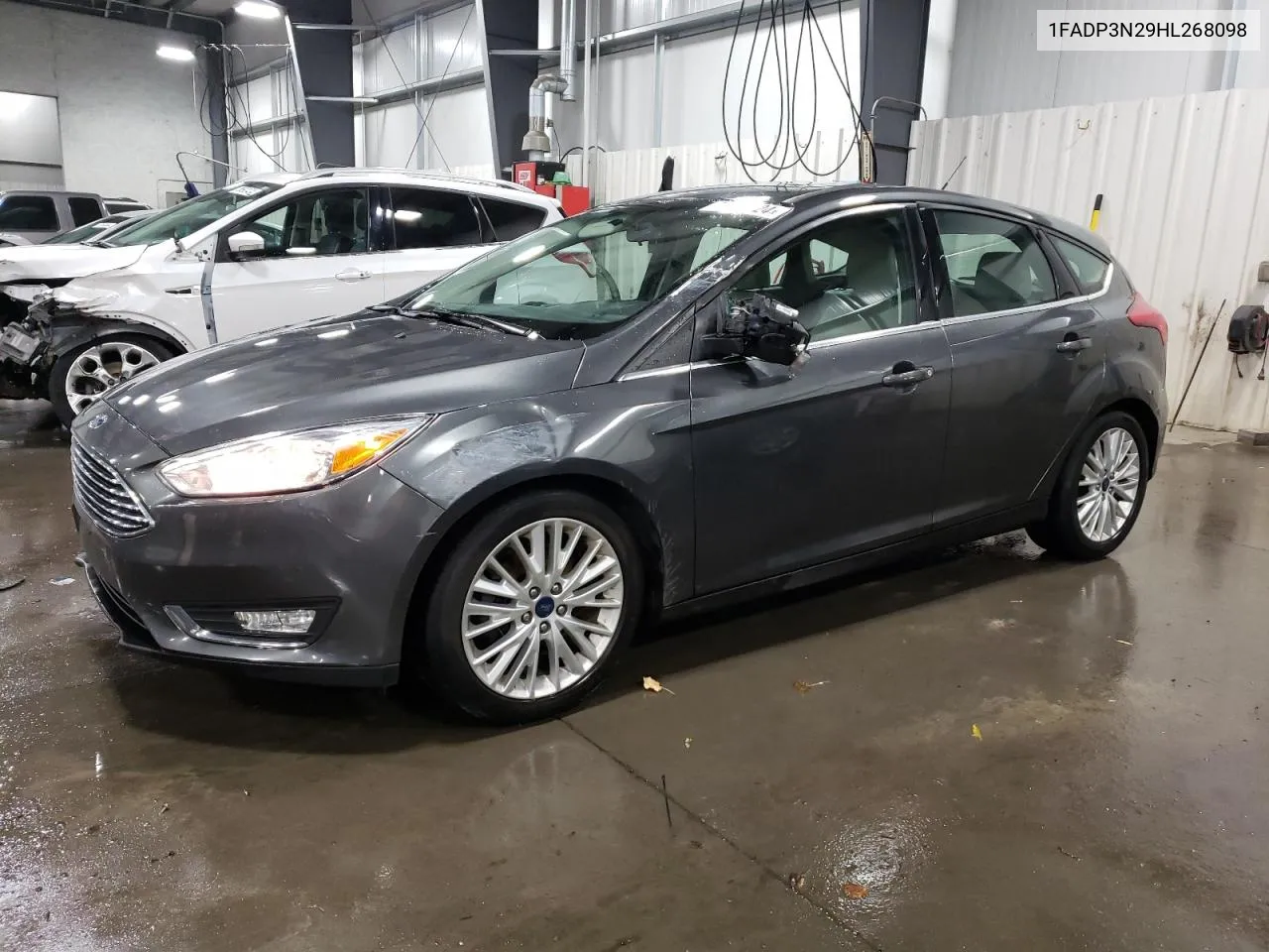 2017 Ford Focus Titanium VIN: 1FADP3N29HL268098 Lot: 76953624