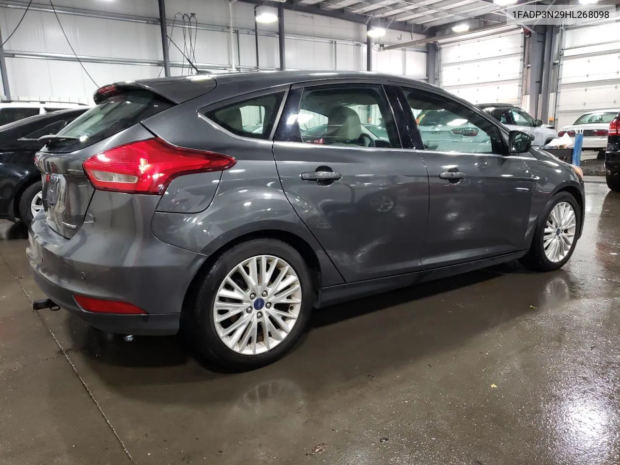 2017 Ford Focus Titanium VIN: 1FADP3N29HL268098 Lot: 76953624