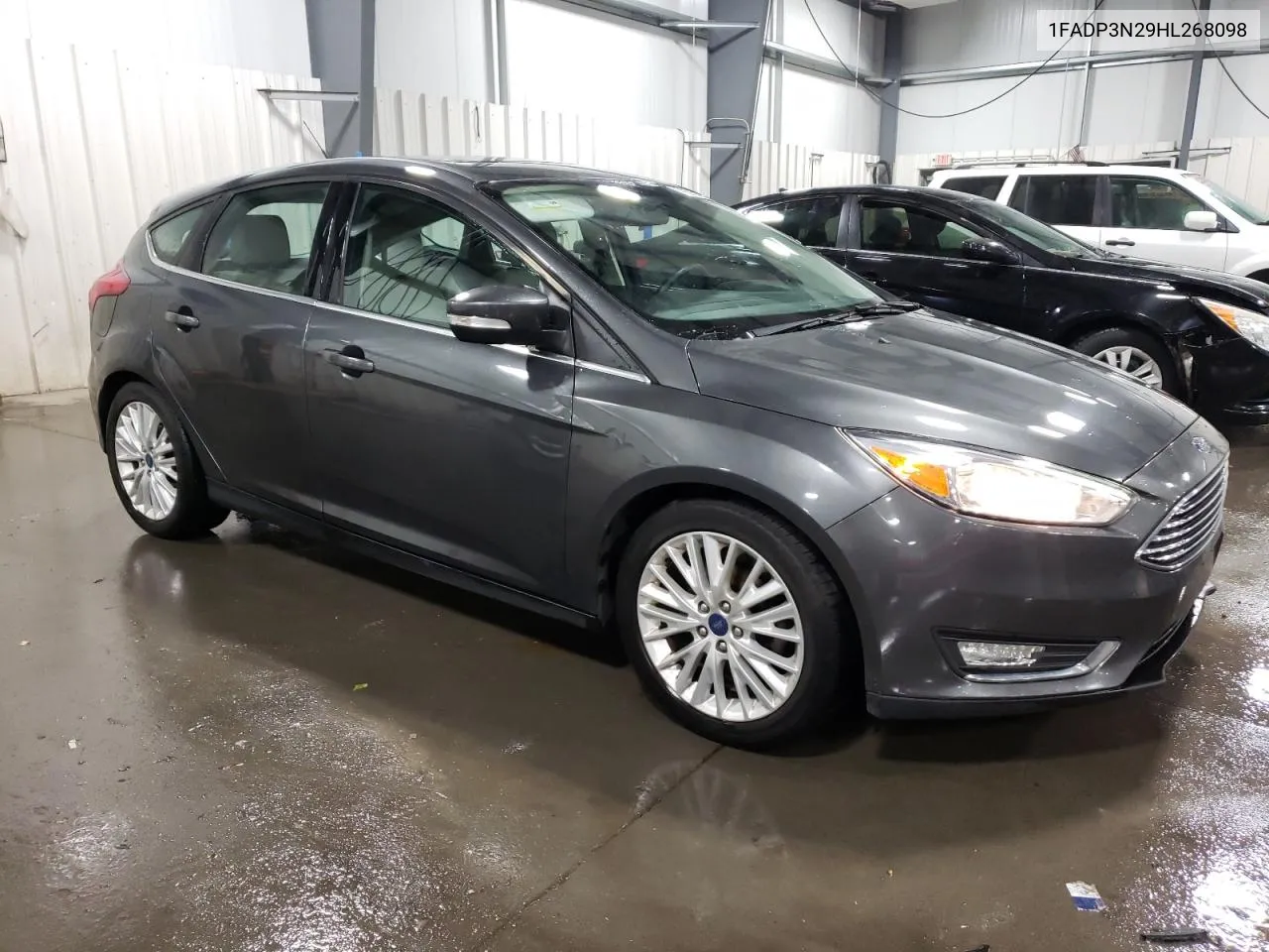 2017 Ford Focus Titanium VIN: 1FADP3N29HL268098 Lot: 76953624