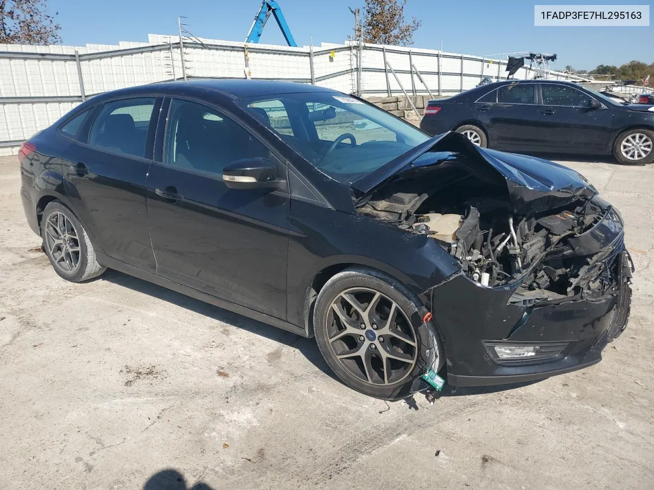 2017 Ford Focus Se VIN: 1FADP3FE7HL295163 Lot: 77028474