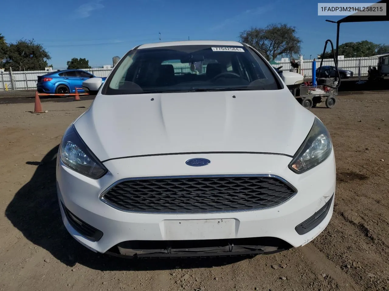 2017 Ford Focus Sel VIN: 1FADP3M21HL258215 Lot: 77042584