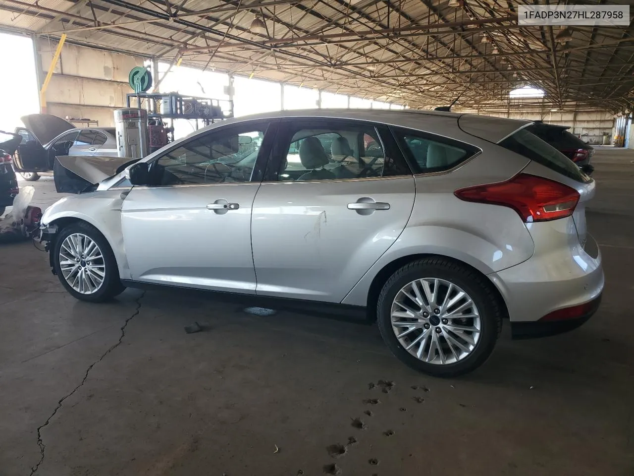 2017 Ford Focus Titanium VIN: 1FADP3N27HL287958 Lot: 77702404