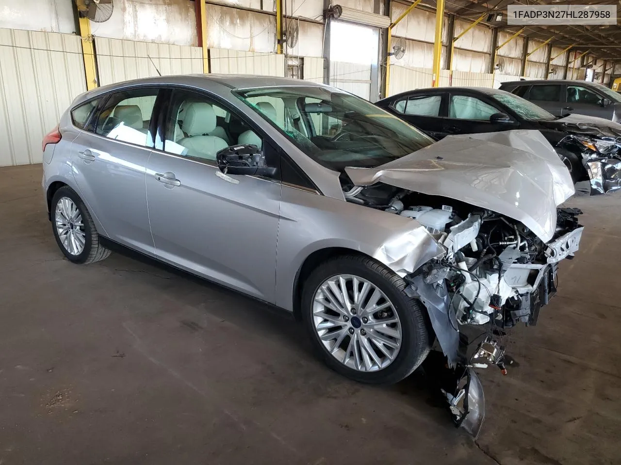 2017 Ford Focus Titanium VIN: 1FADP3N27HL287958 Lot: 77702404