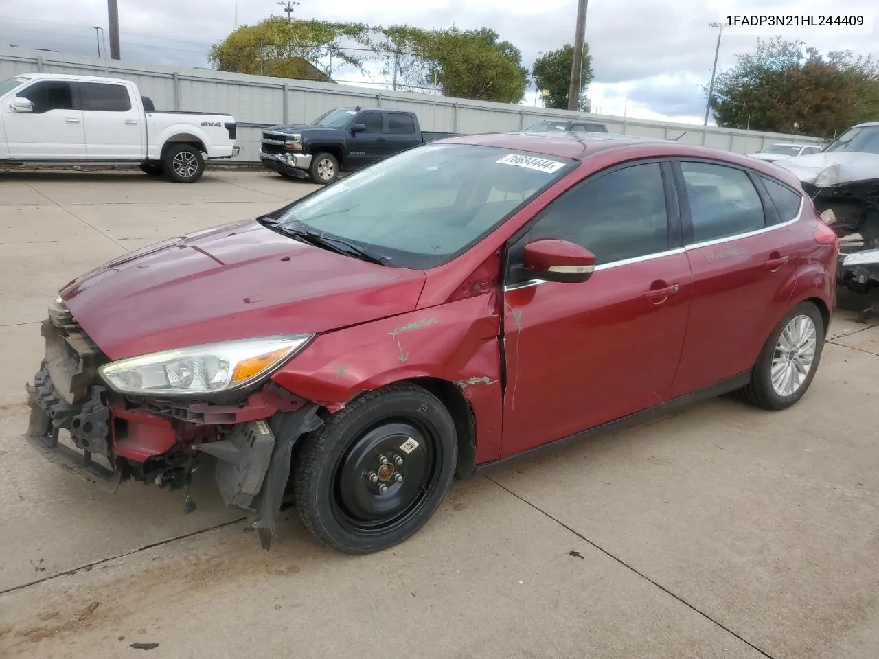 2017 Ford Focus Titanium VIN: 1FADP3N21HL244409 Lot: 78684444