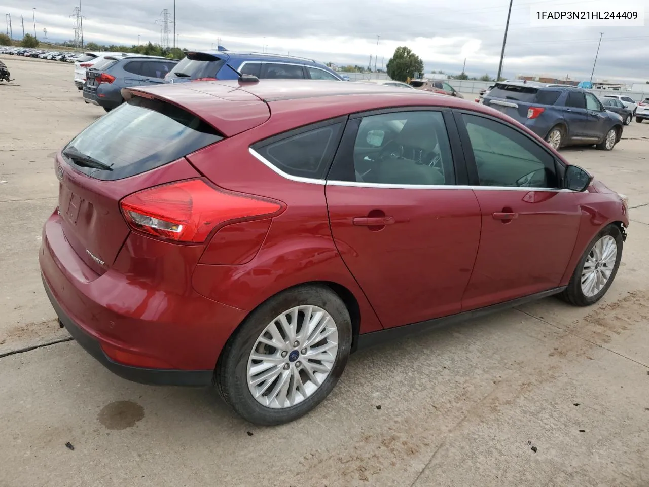 2017 Ford Focus Titanium VIN: 1FADP3N21HL244409 Lot: 78684444