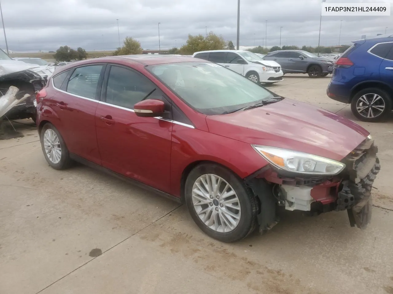 2017 Ford Focus Titanium VIN: 1FADP3N21HL244409 Lot: 78684444