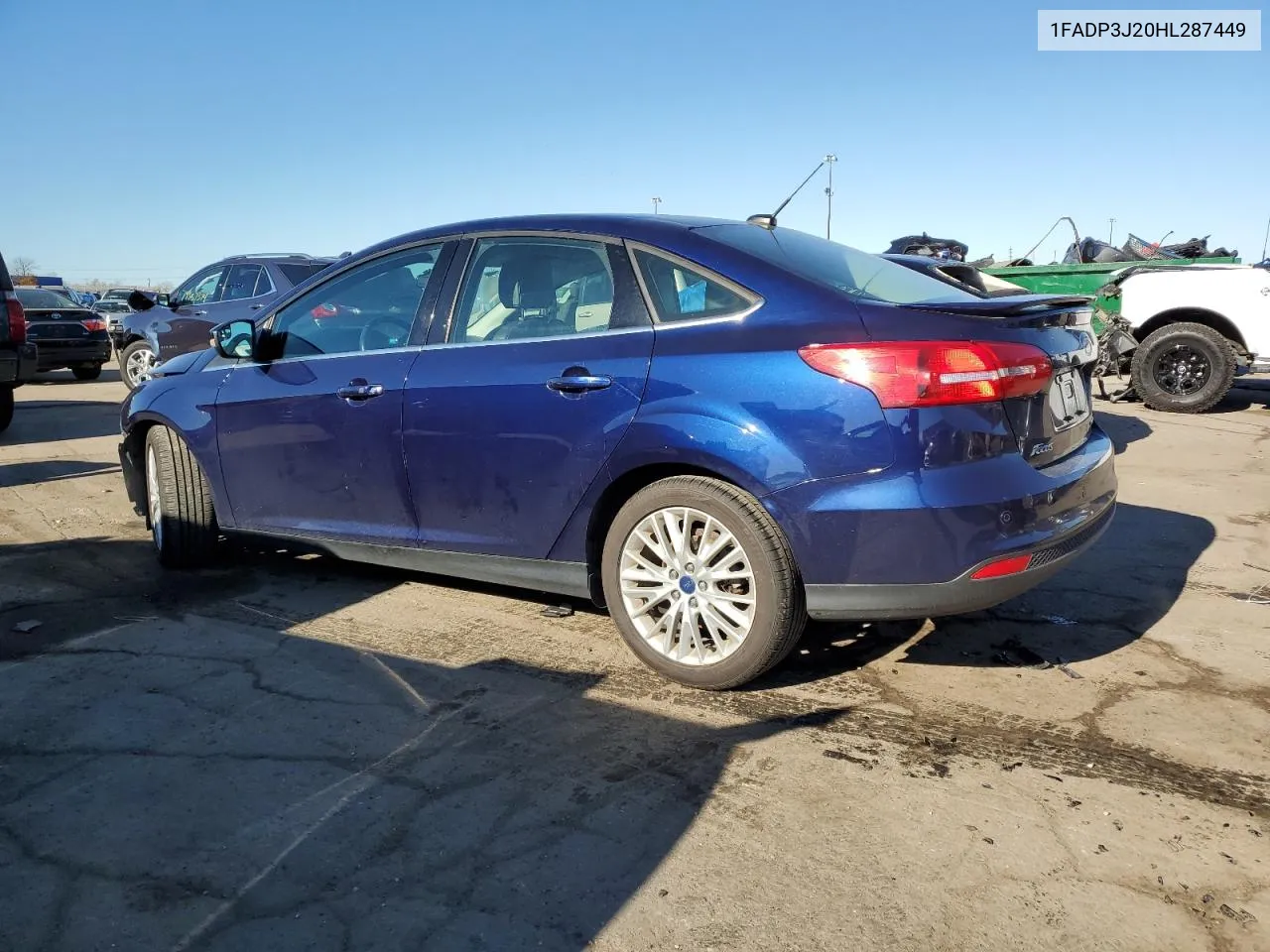 2017 Ford Focus Titanium VIN: 1FADP3J20HL287449 Lot: 79448614