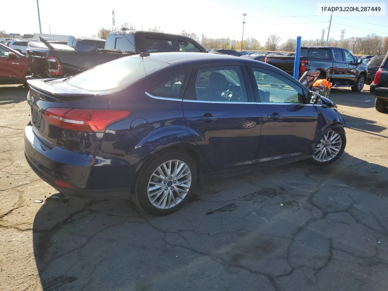 2017 Ford Focus Titanium VIN: 1FADP3J20HL287449 Lot: 79448614