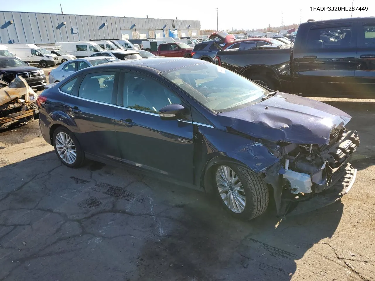 2017 Ford Focus Titanium VIN: 1FADP3J20HL287449 Lot: 79448614