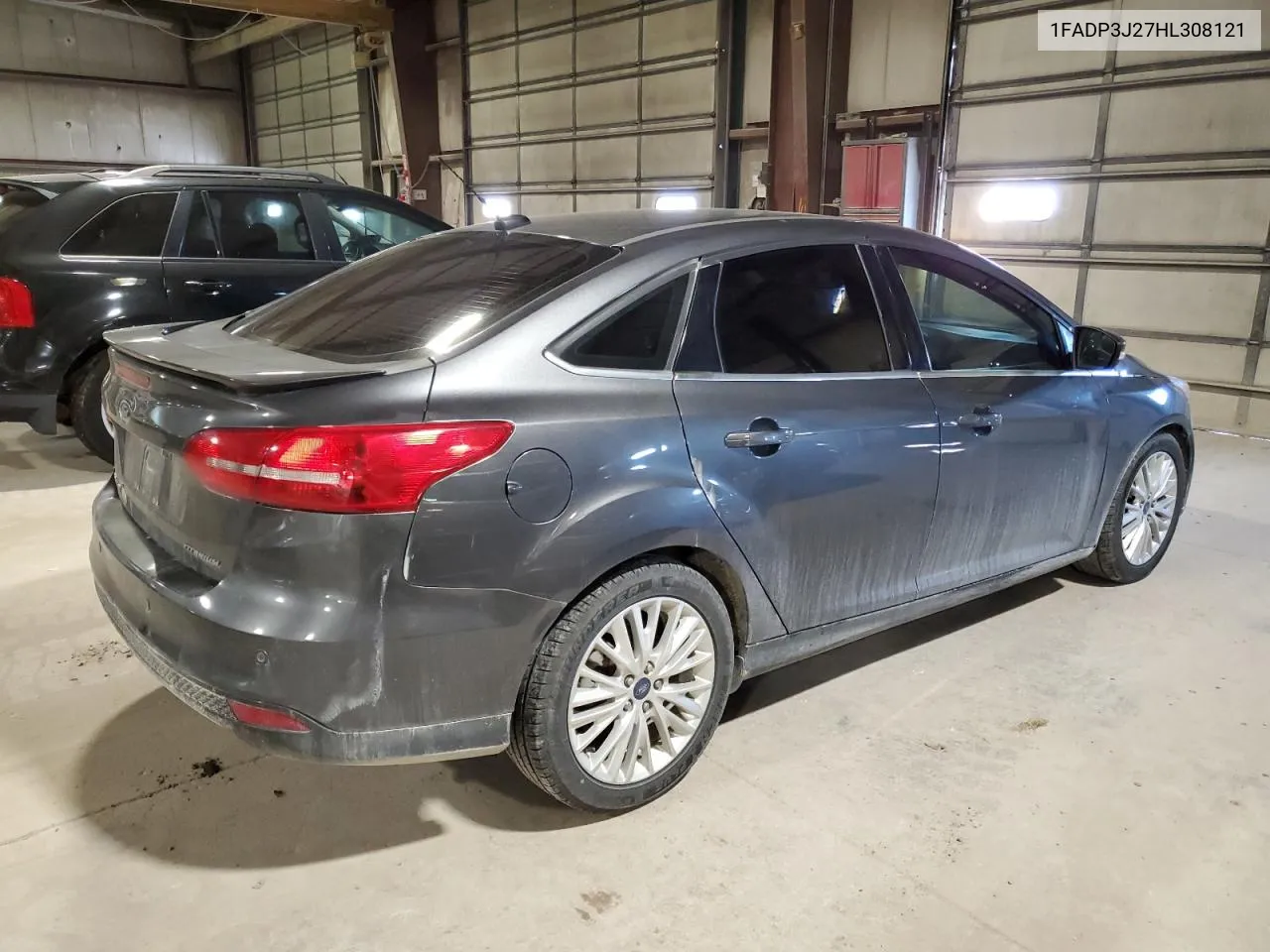 2017 Ford Focus Titanium VIN: 1FADP3J27HL308121 Lot: 79469884