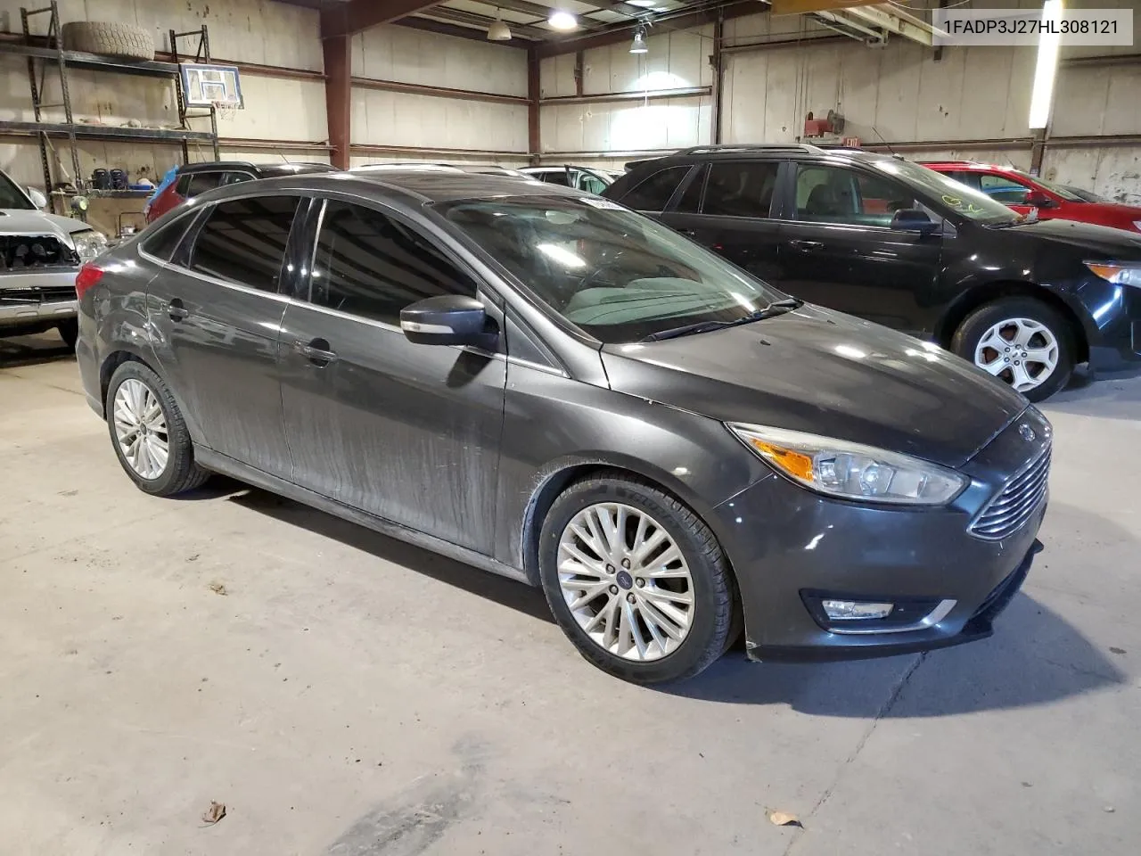 2017 Ford Focus Titanium VIN: 1FADP3J27HL308121 Lot: 79469884